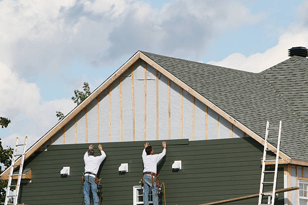 Professional Emergency Siding Repair technician working in Harwick, PA